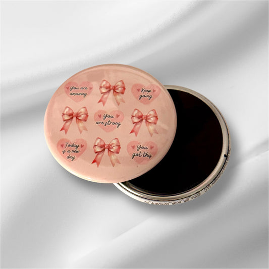 Motivational pink ribbon and heart magnet